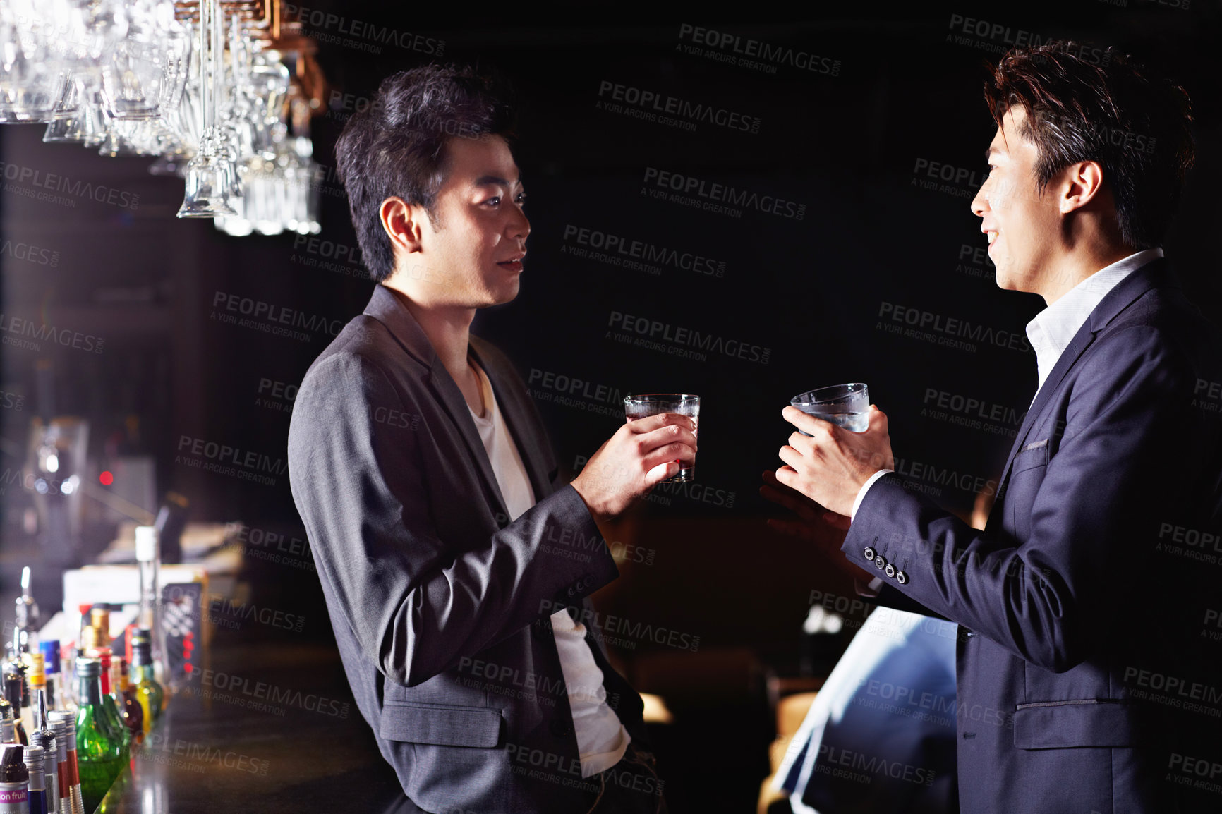 Buy stock photo Drink, talk and relax with asian people in club for happy hour, hangout and social gathering. Party event, alcohol and discussion with friends at night pub for bonding, weekend break and bar