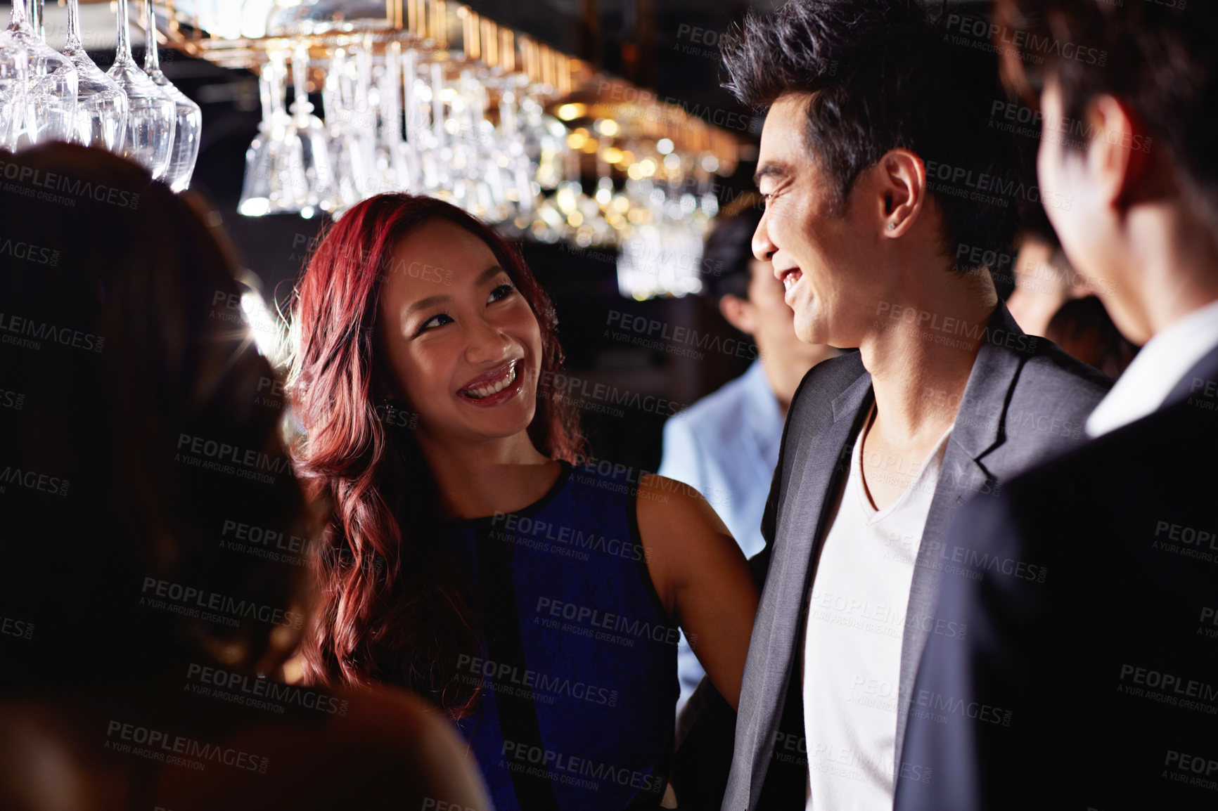 Buy stock photo Relax, talk and smile with asian people in club for happy hour, hangout and social gathering. Party event, alcohol and discussion with friends at night pub for bonding, weekend break and bar