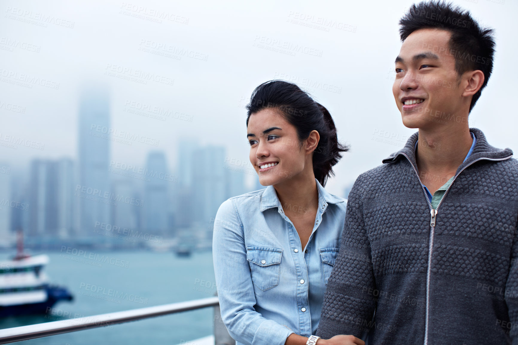 Buy stock photo Couple, smile and love on promenade for holiday, date and walk for sightseeing or bonding. Asian man, happy woman and tourist with trip, vacation and travel for honeymoon or romance at waterfront