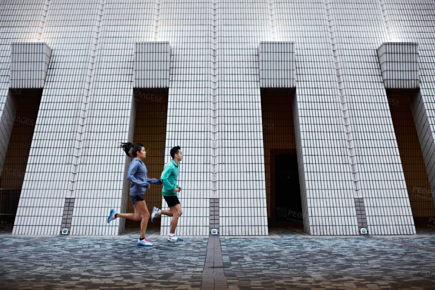 Buy stock photo Exercise, woman and running with personal trainer in city for race practice, speed training or health. Fast, person or coach with sprint outdoor for athletic performance, fitness and pace improvement