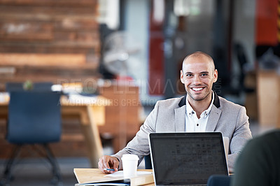 Buy stock photo Portrait of a handsome man sitting at his desk