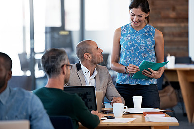 Buy stock photo Shot of a group of people working in an open office