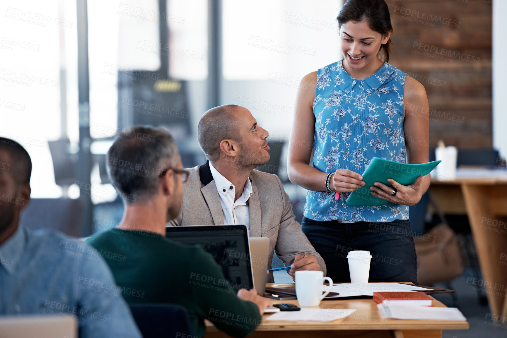 Buy stock photo Shot of a group of people working in an open office