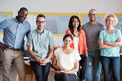 Buy stock photo Portrait of a group of coworkers standing together in an office
