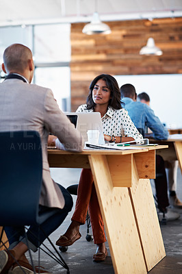 Buy stock photo Shot of a group of people working in an open office