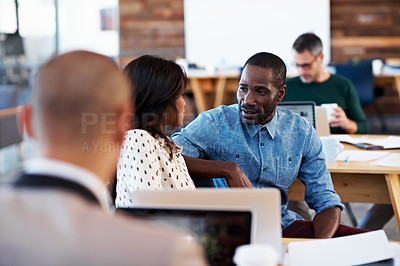 Buy stock photo Shot of a group of people working in an open office