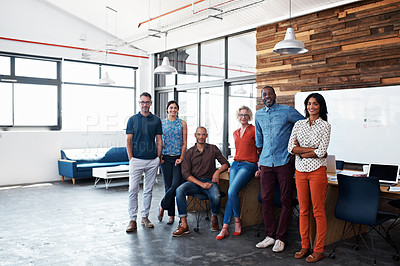 Buy stock photo Portrait of a group of coworkers standing together in an office