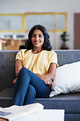 Buy stock photo Portrait of a beautiful woman sitting in an modern office