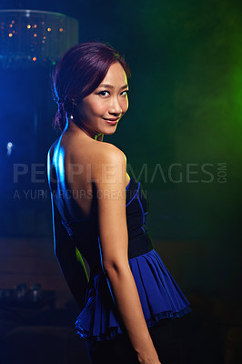Buy stock photo Portrait of an attractive young asian woman in a nightclub