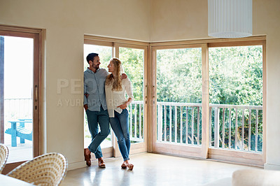 Buy stock photo Full length shot of a couple standing in their home