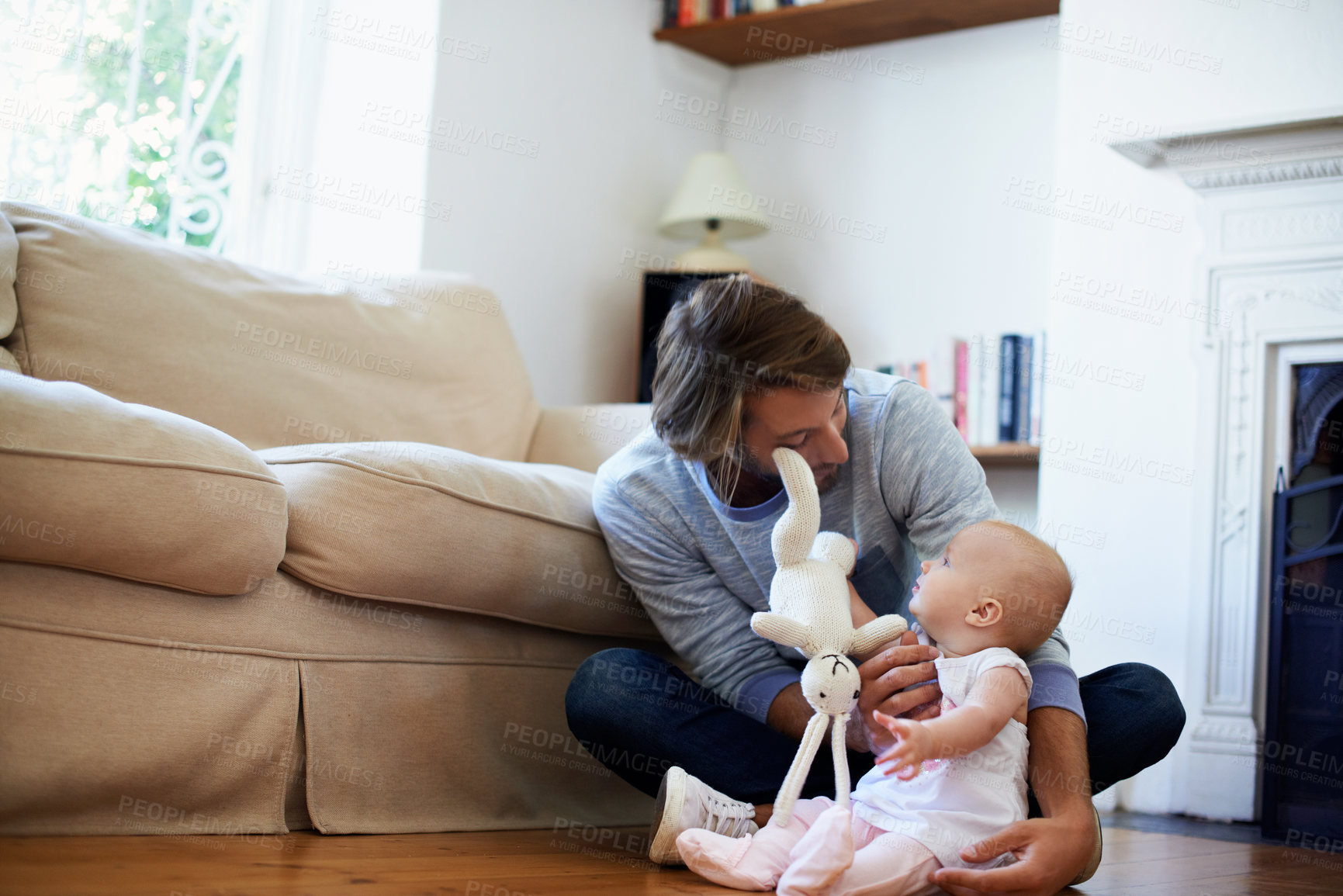 Buy stock photo Father, baby and stuffed animal for playing in home, bonding and care with parenting for development. Man, infant child and toys for relationship with childcare, wellness and games together in lounge