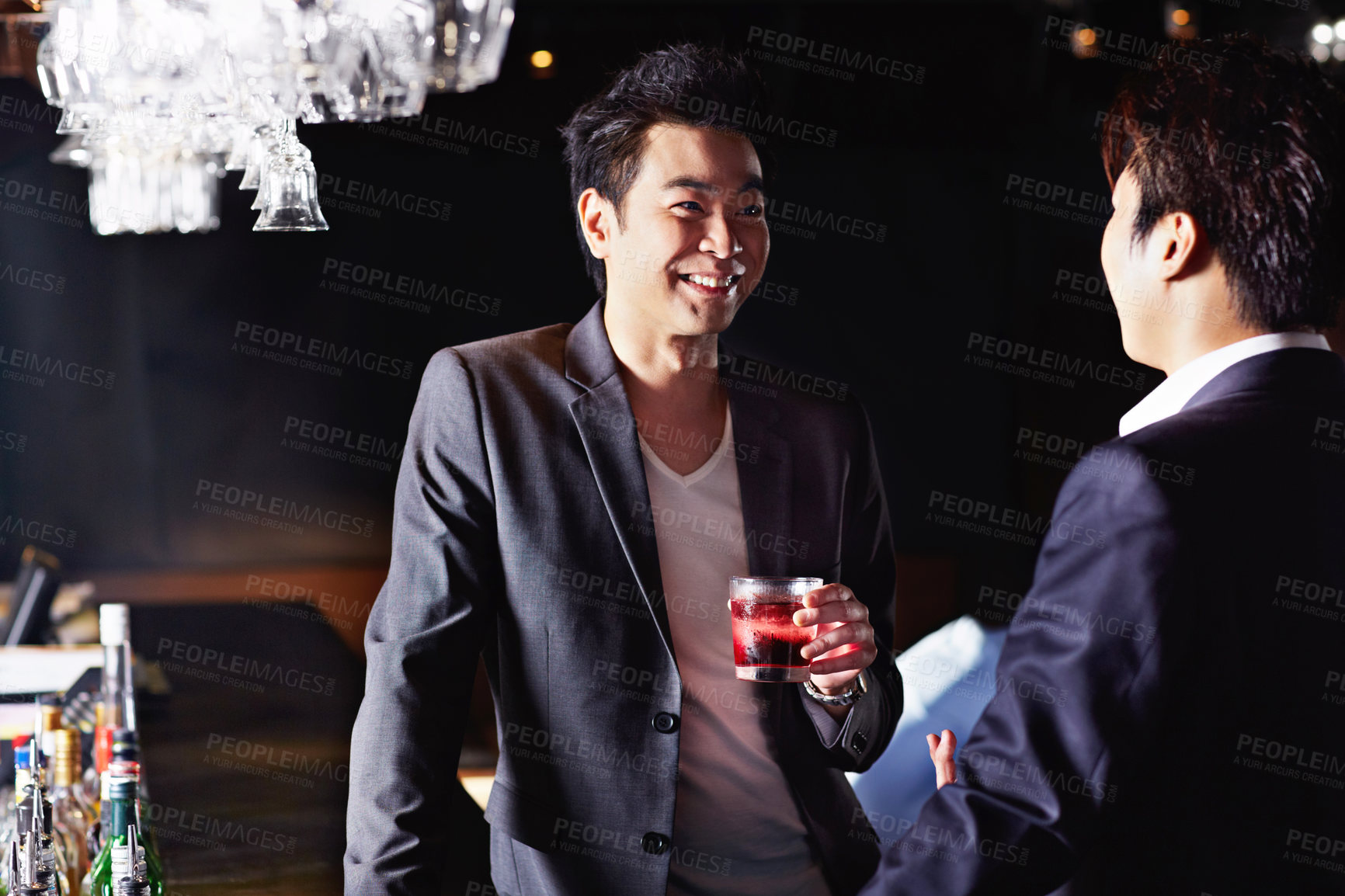 Buy stock photo Drink, smile and relax with asian people in club for happy hour, hangout and social gathering. Party event, alcohol and discussion with friends at night pub for bonding, weekend break and bar