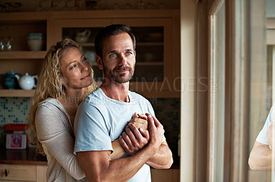 Buy stock photo Cropped shot of an affectionate couple in the kitchen