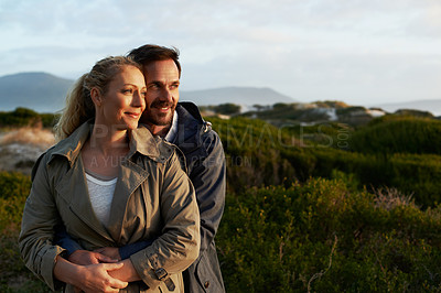 Buy stock photo Cropped shot of an affectionate couple standing outdoors
