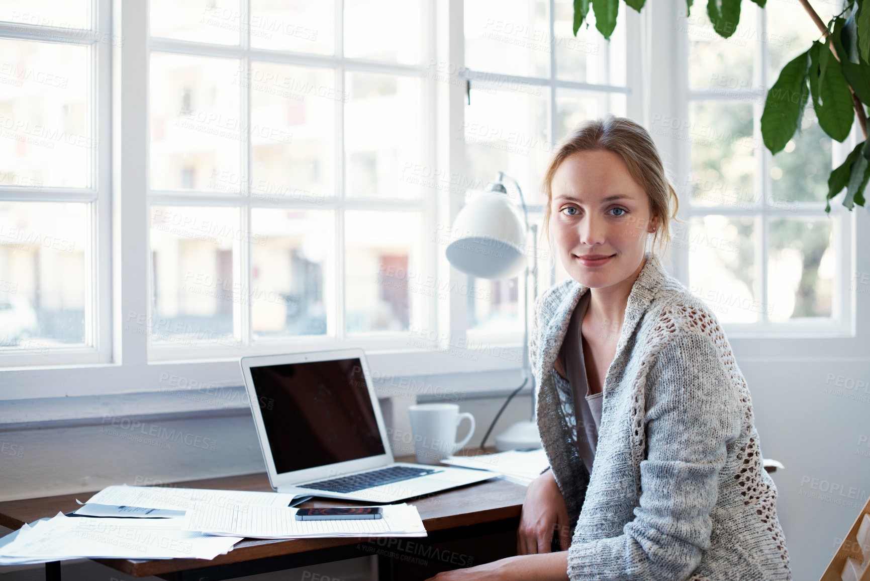 Buy stock photo Smile, woman and portrait in home office for remote work, documents and laptop with creative freelancer. Editor, proofreading and female person in house, research or review with technology for WFH