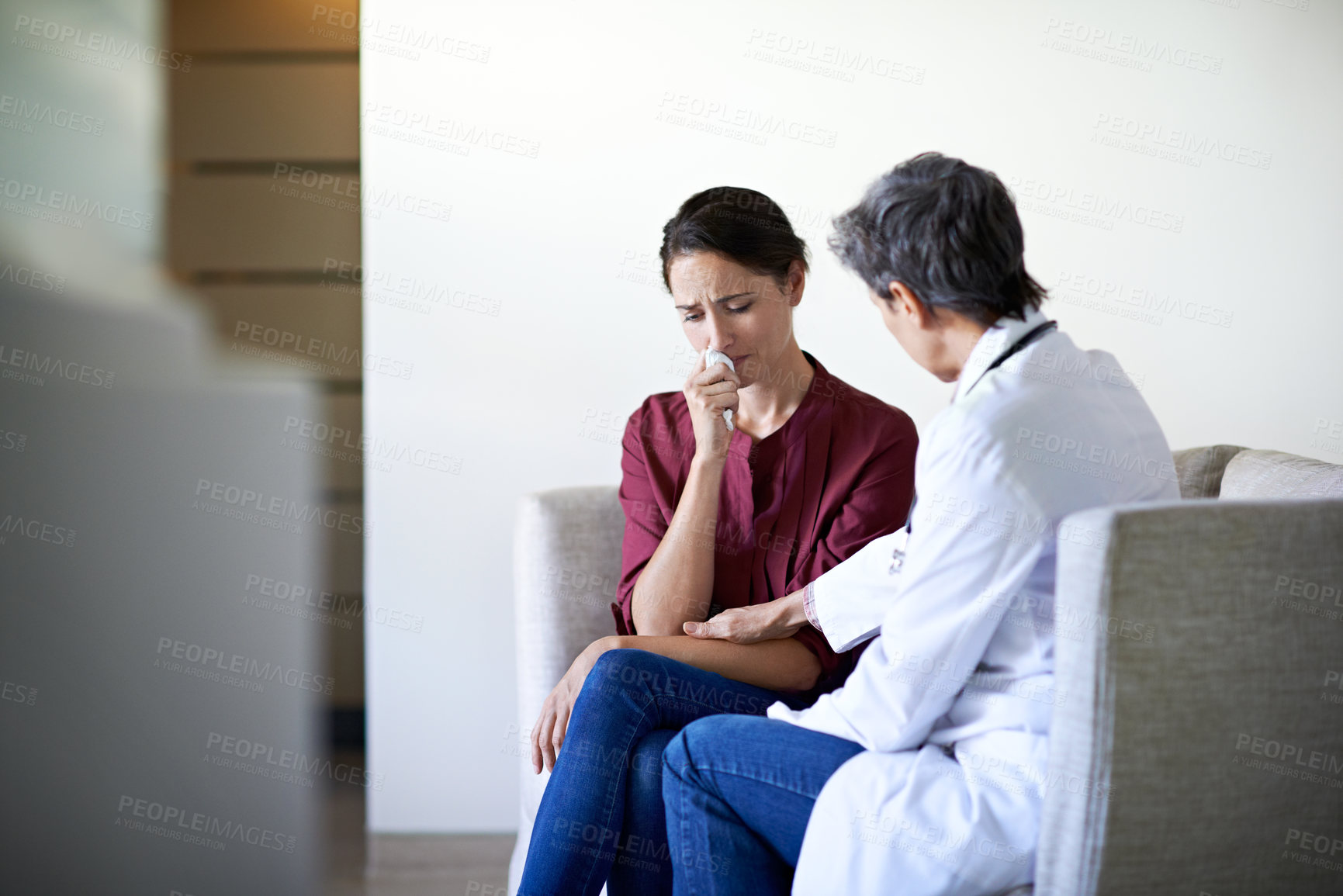 Buy stock photo Crying, woman and doctor empathy in waiting room for bad news, surgery complication or bereavement. Worker, sad person and emotional comfort in clinic for medical update, patient loss and compassion