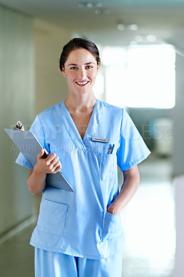 Buy stock photo Portrait of a beautiful young doctor standing in a hospital