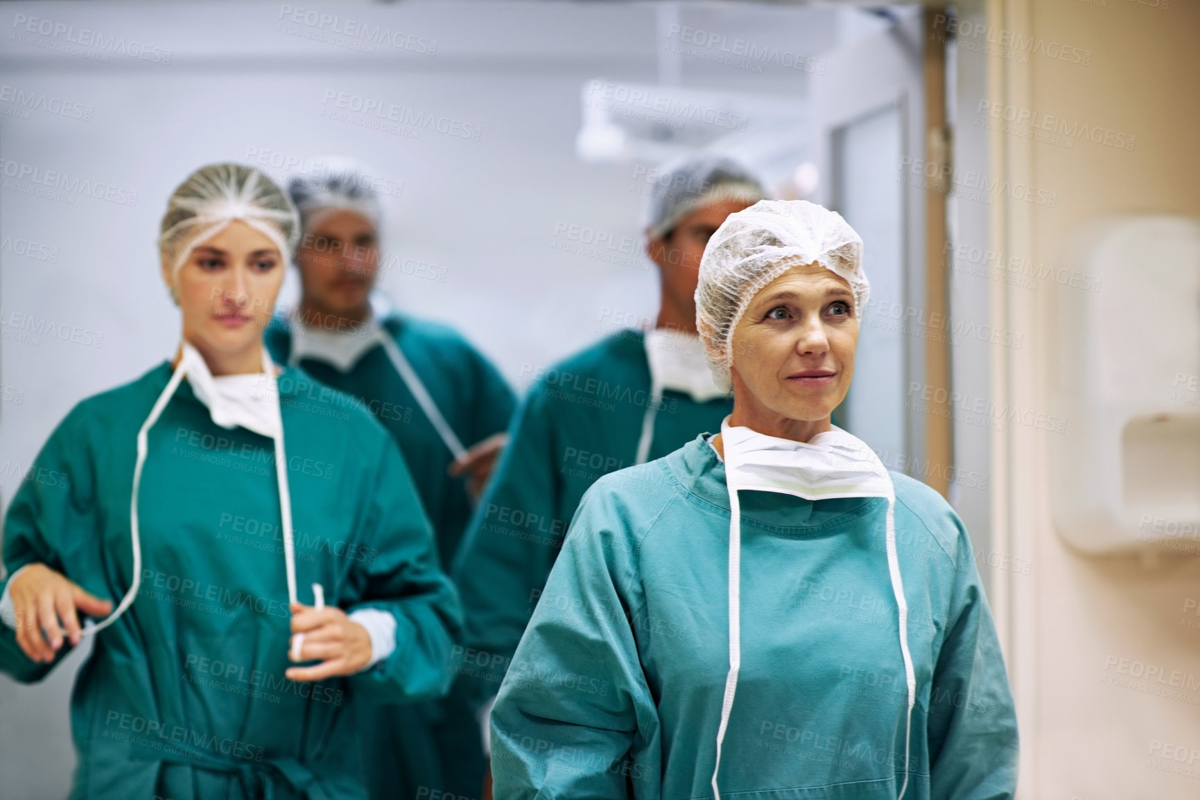 Buy stock photo Medical, teamwork and walking with doctors in hospital together for operation or surgery. Collaboration, healthcare and service with surgeon group in scrubs for help, support or theater at clinic