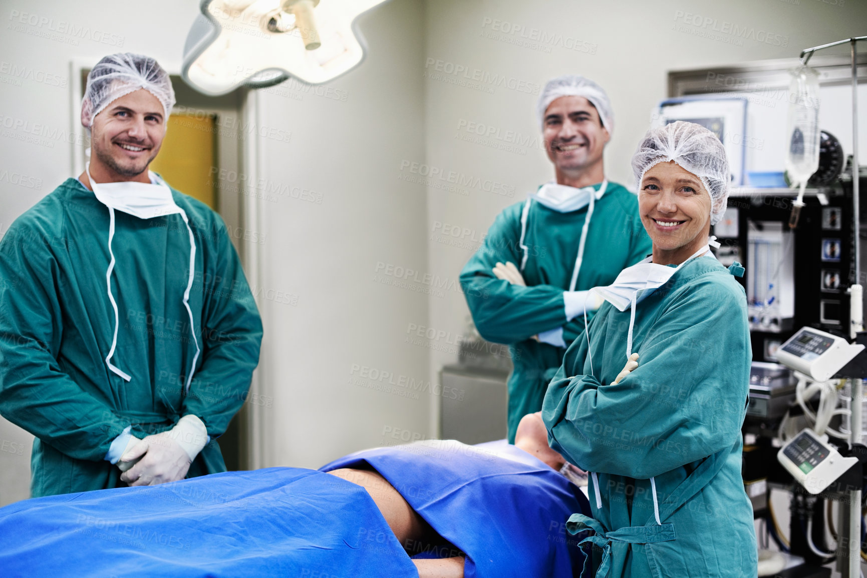 Buy stock photo Portrait of a team of surgeons in an operating theatre