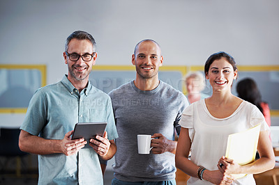 Buy stock photo Cropped portrait of three businesspeople standing in an office