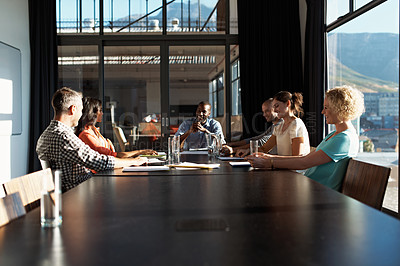 Buy stock photo Cropped shot of a business meeting in progress