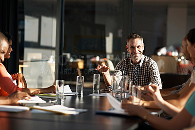 Buy stock photo Cropped shot of a business meeting in progress