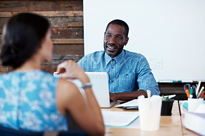 Buy stock photo Cropped shot businesspeople working in an office