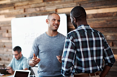 Buy stock photo Cropped shot of three businessmen in an office