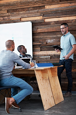 Buy stock photo Full length shot of three businessmen in an office