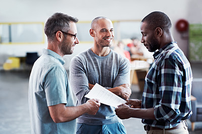Buy stock photo Cropped shot of three businessmen in an office