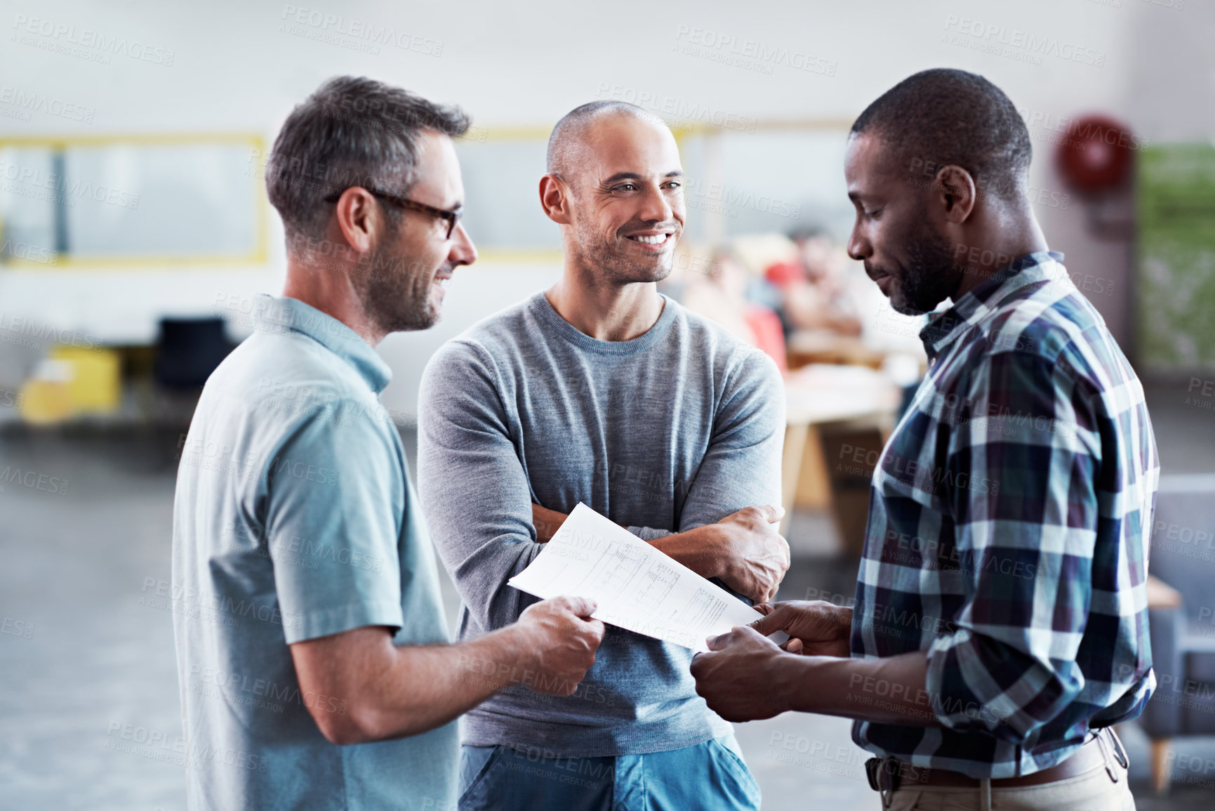 Buy stock photo Cropped shot of three businessmen in an office