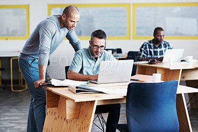 Buy stock photo Cropped shot of three businessmen in an office