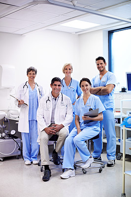 Buy stock photo Portrait of successful team of doctors in a hospital