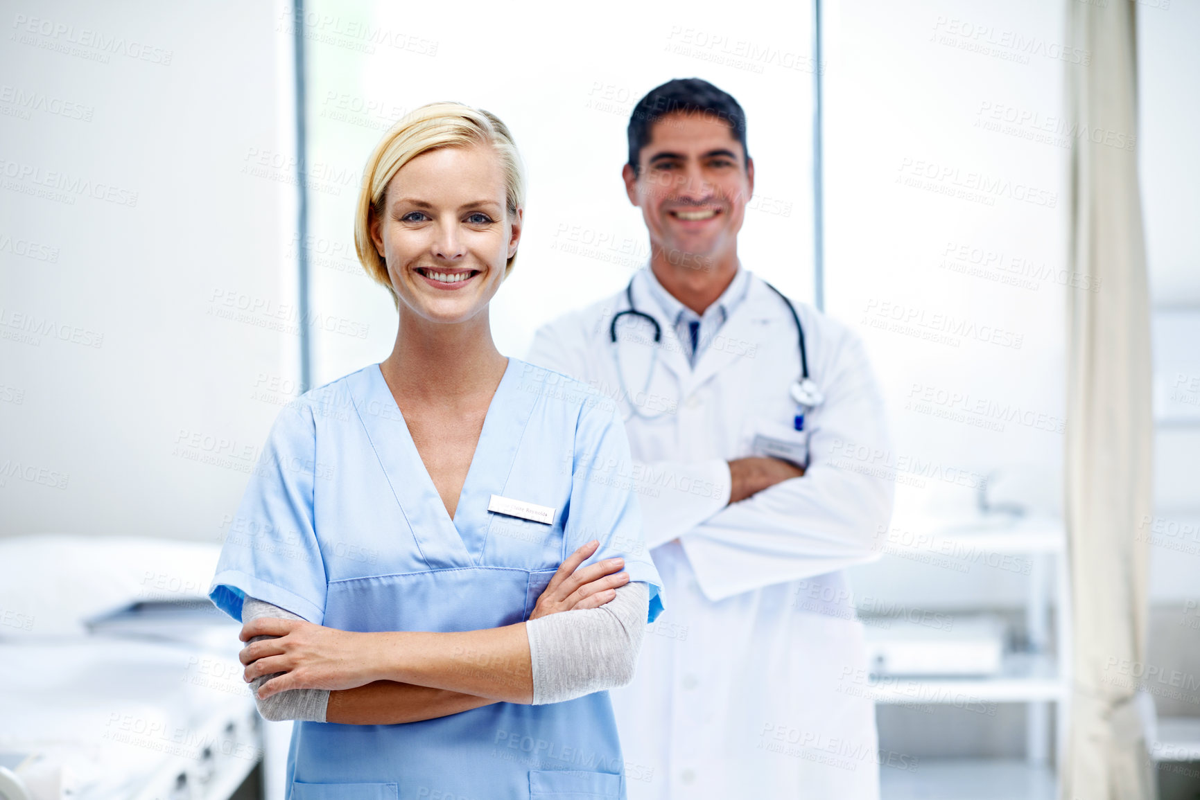 Buy stock photo Medical team, smile and people with arms crossed in clinic, portrait or pride for career development. Hospital, healthcare professional and colleagues with duty, happy and wellness job in Canada