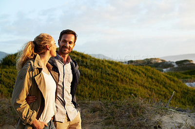 Buy stock photo Shot of an adventurous couple spending time in the outdoors