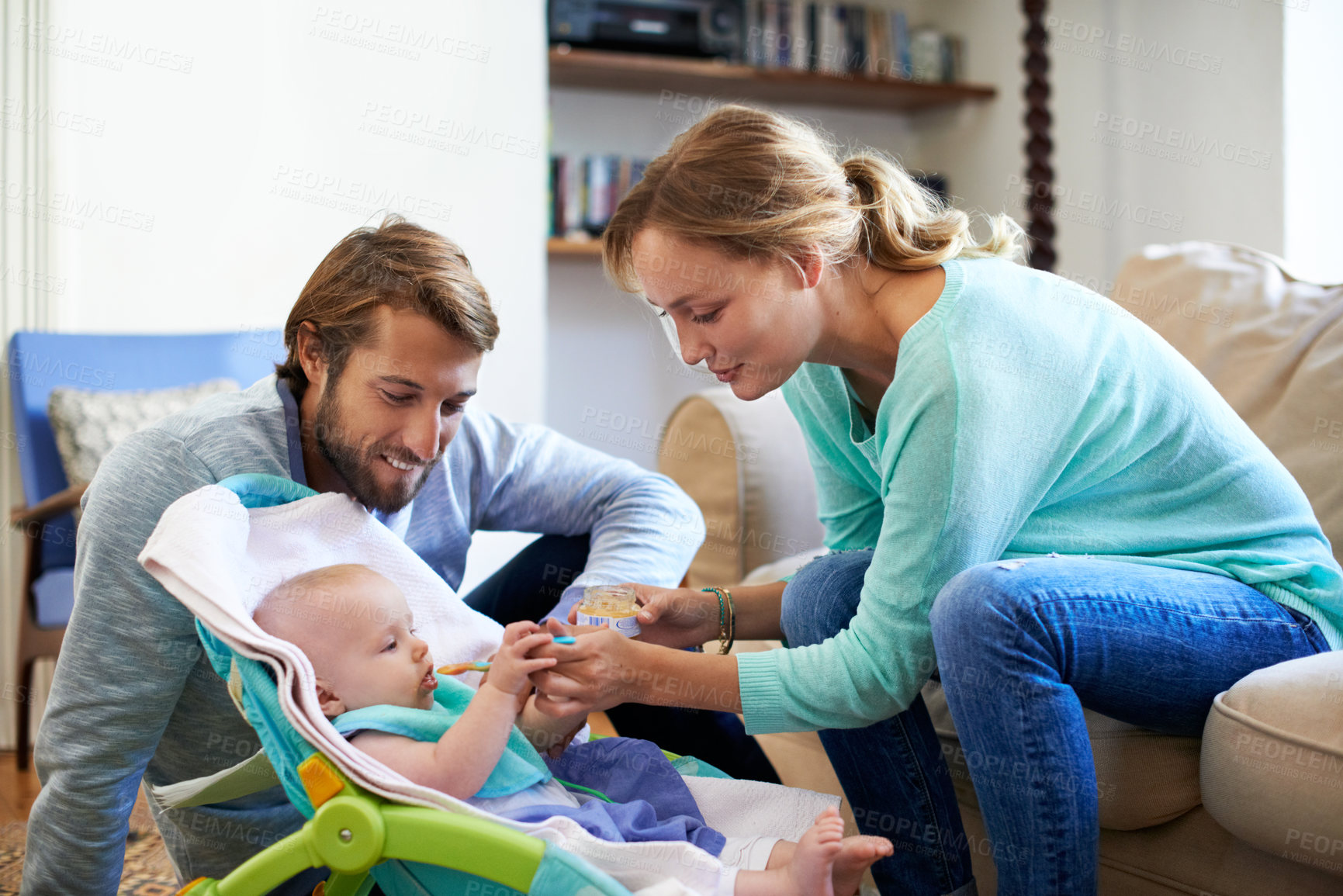 Buy stock photo Love, parents and baby in home with food, parenthood and bonding together in child growth. Childcare, people and family in lounge with feeding, happy or support for wellness with healthy development