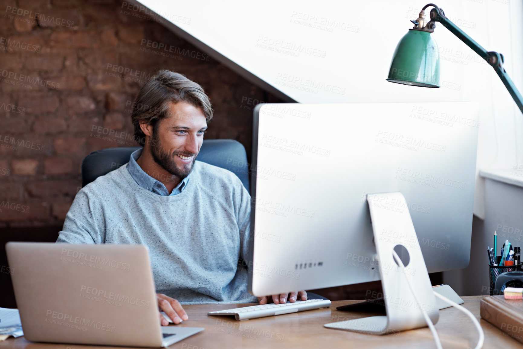Buy stock photo Man, smile and remote work in home office with computer, insurance administration or risk assessment. Happy, person or contractor in house with desktop, online incident report or review policy claim.