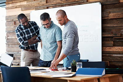 Buy stock photo Cropped shot of three businessmen in an office