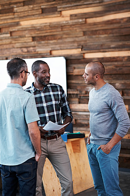 Buy stock photo Cropped shot of three businessmen in an office