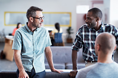 Buy stock photo Cropped shot of three businessmen in an office