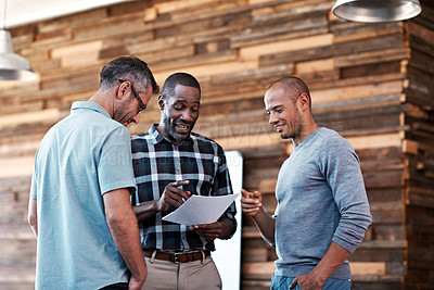 Buy stock photo Cropped shot of three businessmen in an office