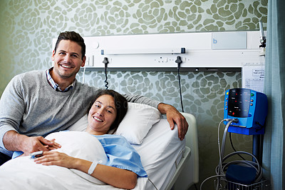 Buy stock photo Portrait of a man comforting his wife in the hospital