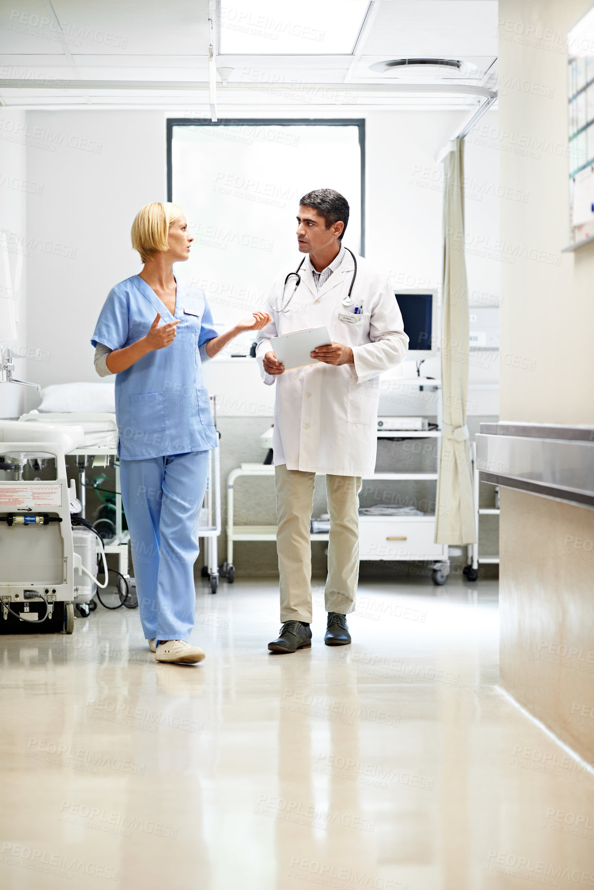 Buy stock photo Talking, nurse and folder with people in hospital for medical, consulting and support team. Meeting, collaboration or healthcare with man and woman in clinic for feedback, doctor and physician advice