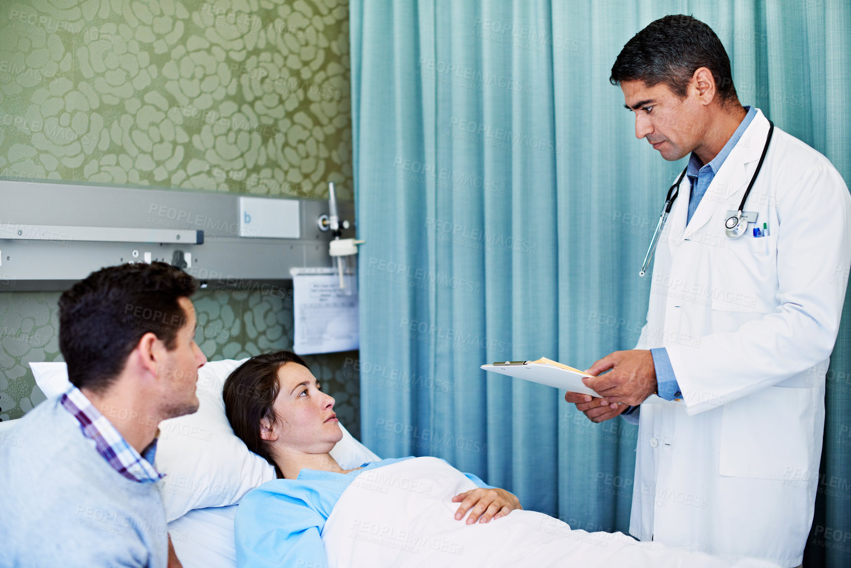 Buy stock photo Doctor, couple and patient with documents for healthcare diagnosis or test results in hospital bed. Male person, health worker or medical professional with paperwork for news or clinic checkup in ICU