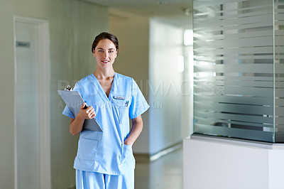 Buy stock photo Portrait of a nurse standing in a hospital corridor
