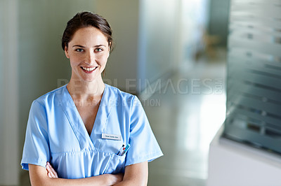 Buy stock photo Portrait of a nurse standing in a hospital corridor