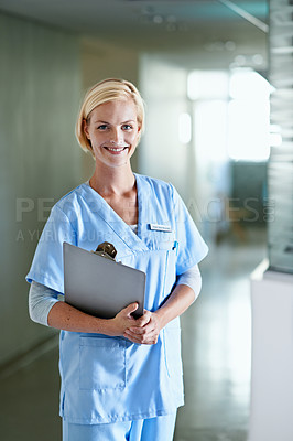Buy stock photo Portrait of a nurse standing in a hospital corridor