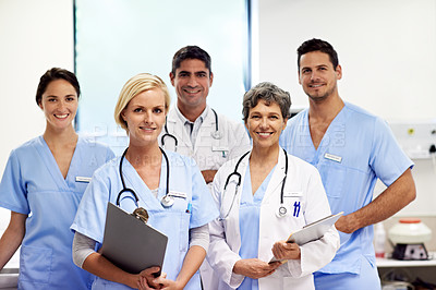 Buy stock photo Portrait of successful team of doctors in a hospital