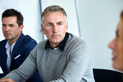 Buy stock photo Shot of a group of coworkers having a meeting in an office