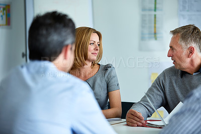 Buy stock photo Shot of a group of coworkers having a meeting in an office